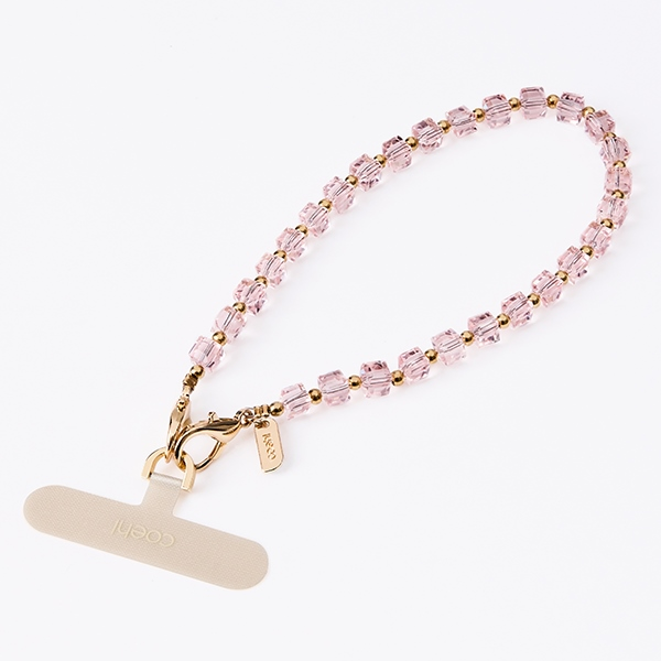 UNIQ Coehl Candy Gem Handstrap universal phone strap for hand rožinės spalvos/rožinės spalvos candy