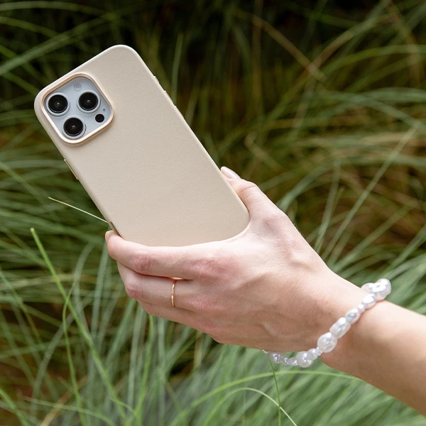 UNIQ Coehl Perla Handstrap universal phone strap for hand baltos spalvos/baltos spalvos pearl