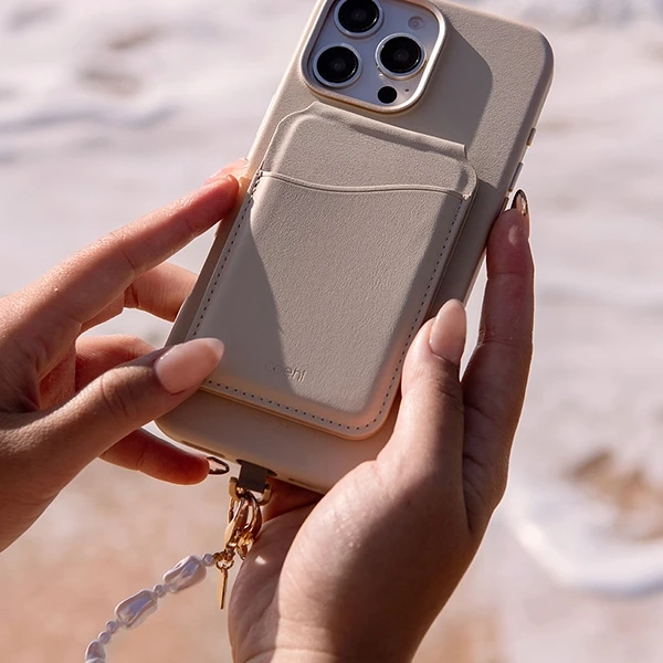 UNIQ Coehl Perla Handstrap universal phone strap for hand baltos spalvos/baltos spalvos pearl