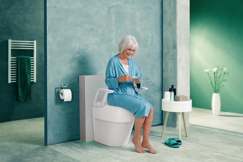 Sundo Homecare GmbH, Vokietija Paaukštinta tualeto sėdynė su porankiais, TSE 2 0-SC (su fiksatoriais)