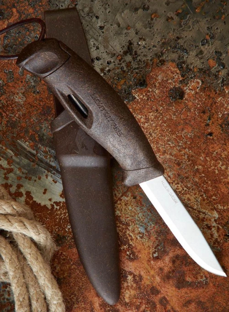 Carruzzo Morakniv "Light My Fire FireKnife" žalios spalvos peilis su akmenukais