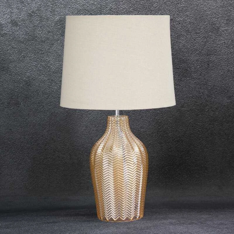 Eurofirany Dekoratyvinis pastatomas šviestuvas su stikliniu pagrindu ir bėžiniu gaubtu, aukso atspalvis, 34x59 cm, glamour ir moderniam interjerui, stilingas kambario apšvietimas