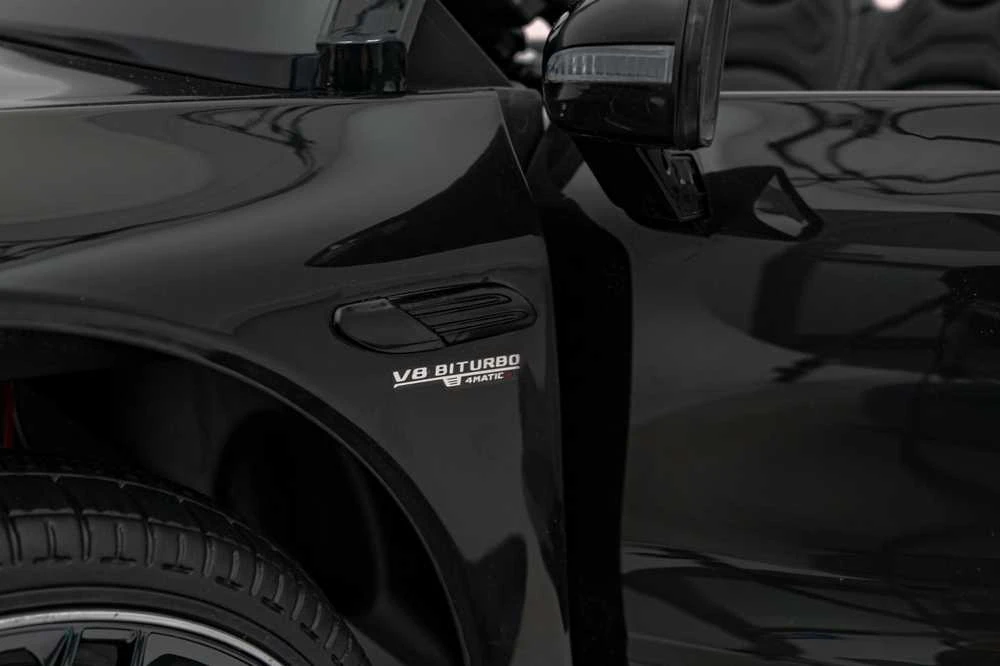 Vaikiškas elektrinis Mercedes Benz AMG SL63 su LED šviesomis ir muzikos funkcija