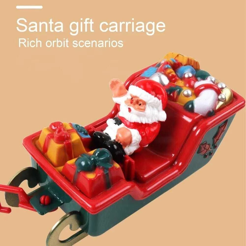 Kalėdinis traukinys ant eglutės su šviesomis ir Merry Christmas garsu
