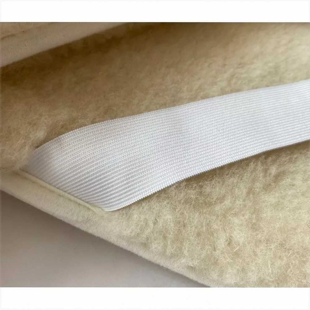 Vilnonis antčiužinis, Merino vilna, dvipusis, terapinis, su dekoratyviniu apsiuvu, 100x200 cm, lovai, natūrali spalva, su kampinėmis gumomis, minkštas paklotas