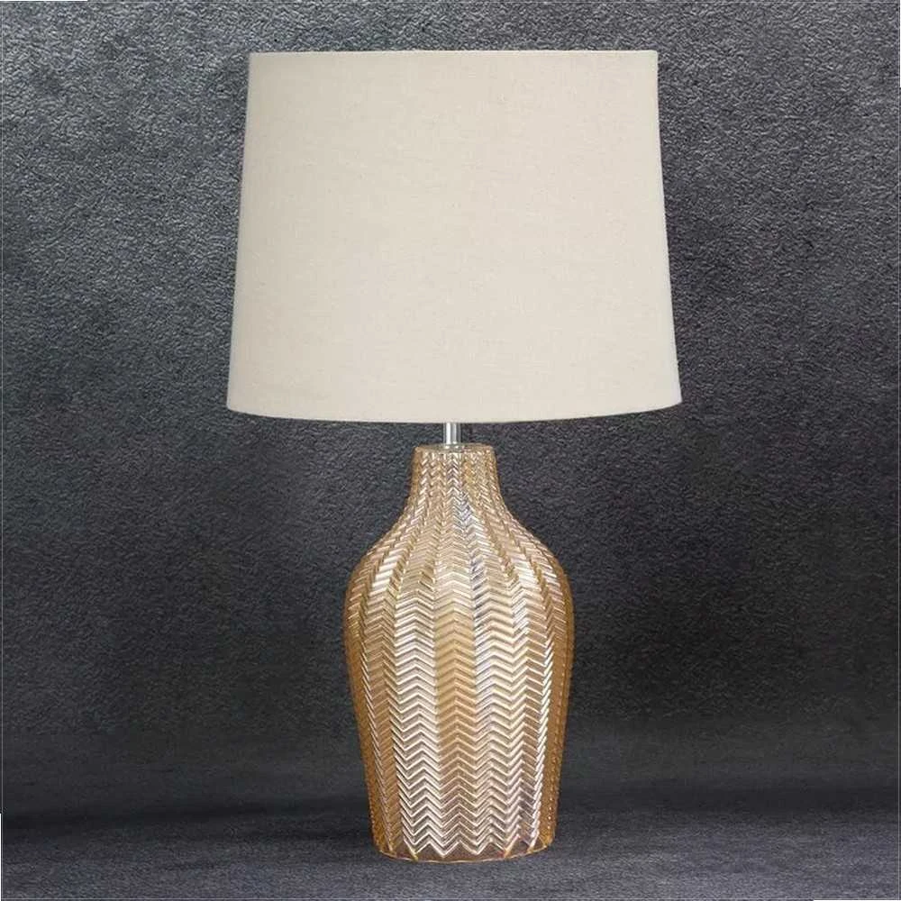Eurofirany Dekoratyvinis pastatomas šviestuvas su stikliniu pagrindu ir bėžiniu gaubtu, aukso atspalvis, 34x59 cm, glamour ir moderniam interjerui, stilingas kambario apšvietimas