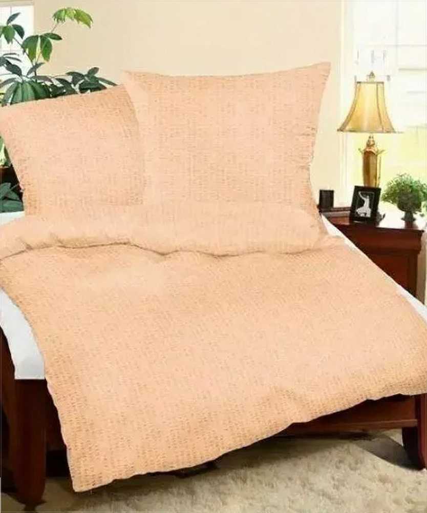 Medvilninės krepo patalynės komplektas 200x220 cm, vientisa abrikosinė spalva, užsegimas sagomis, pridedami 2 pagalvių užvalkalai 70x80 cm, minkšta tekstūra