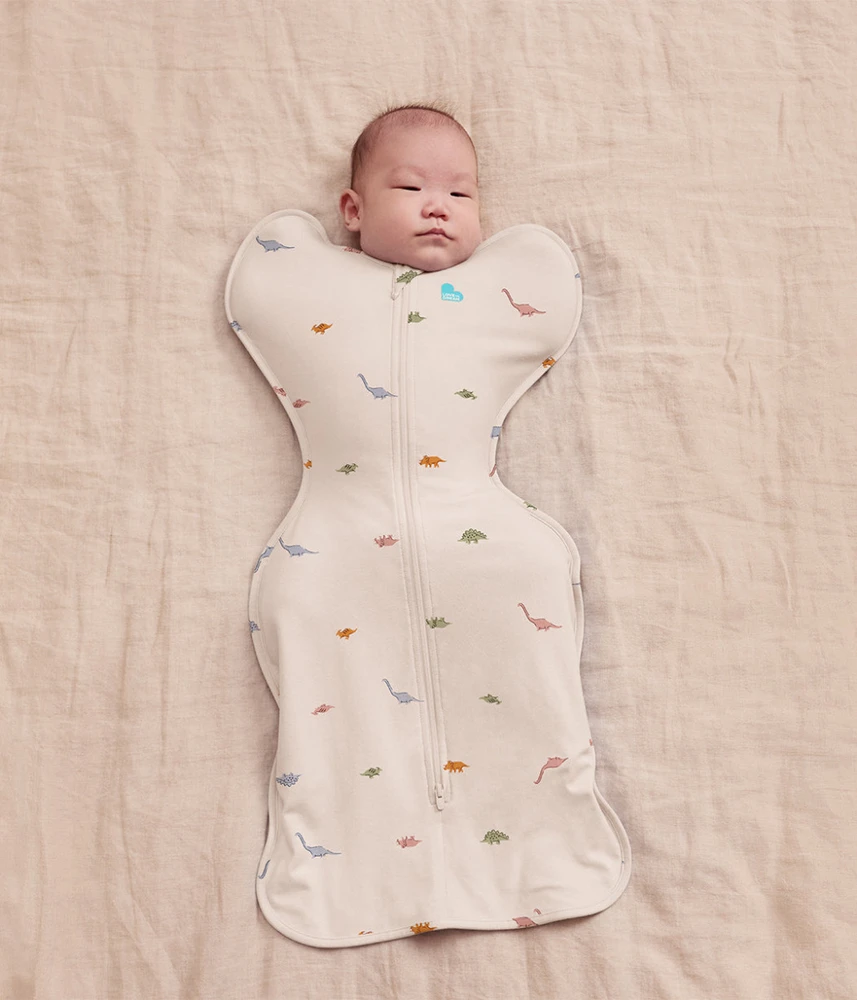 Love To Dream Vystyklavimo maišelis Swaddle UP Stretch – M dydis – dinozaurai