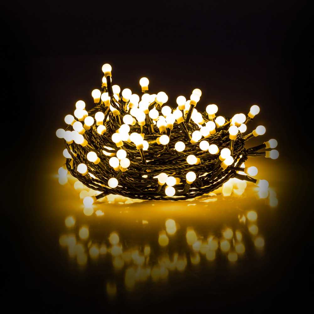 Kalėdinės lemputės Retlux 200 LED šiltai baltos spalvos