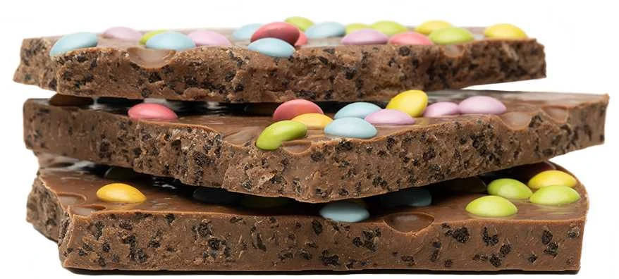 Rūta Pieninis šokoladas su traškiais sausainiais ir dražė saldainiais „Šokoladinė svajonių planeta“, 300g