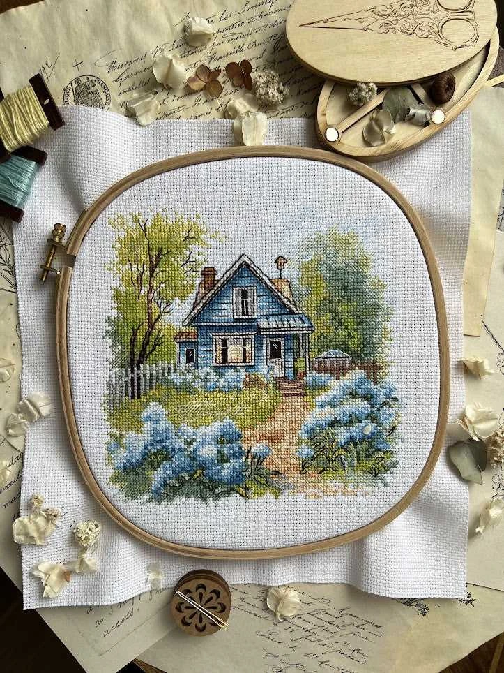 Andriana Beldizart Kryželių siuvinėjimo rinkinys "Šeimos name" 17,5 x 17 cm SANN-37
