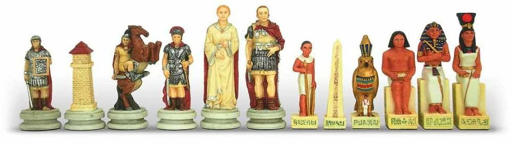 Italfama ROMĖNAI prieš EGIPTIEČIUS: šachmatų rinkinys iš dervos figūrėlių ir dirbtinės odos žaidimo lenta + šaškės ir nardai