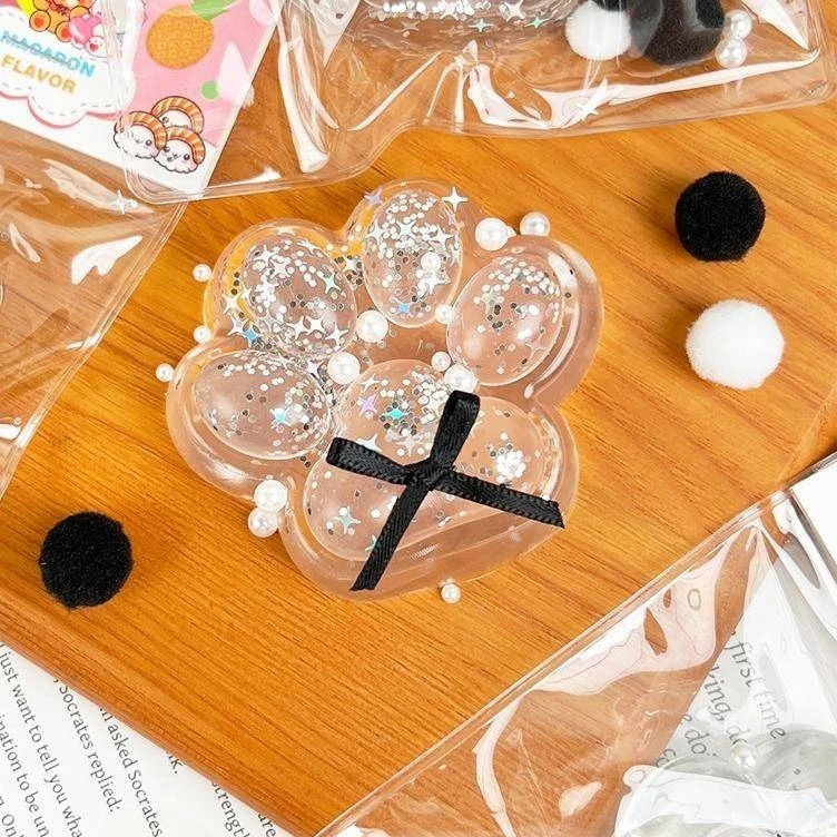 Toyz Permatoma katės letenėlė Squishy – antistresinis jutiminis žaislas su blizgučiais 7 cm