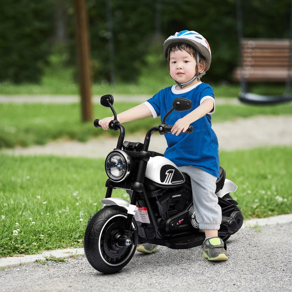 HOMCOM Vaikiškas motociklas Vaikiškas elektrinis motociklas Elektrinė transporto priemonė Vaikiška transporto priemonė su 2 nuimamais mokomaisiais ratais, 3 km/val., skirta 1,5-3 metų vaikams Balta 76 x 42 x 57 cm