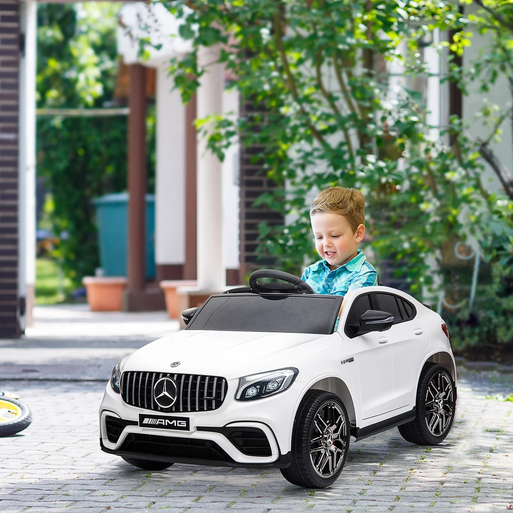 Homcom Mercedes-Benz AMG GLA45 licencijuotas vaikiškas elektrinis automobilis su nuotolinio valdymo pulteliu, MP3, saugos diržais, 37-60 mėn., baltos spalvos