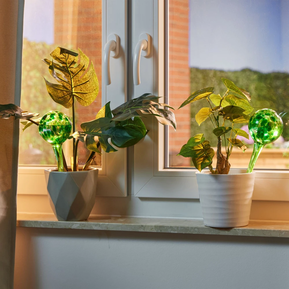Relaxdays 4 stiklinių laistymo gaublių rinkinys
