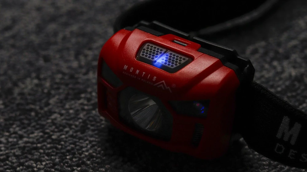Montis Bateryjna latarka nagłowna su sensorem MT002 Raudona, Juodas Headband prožektorius LED