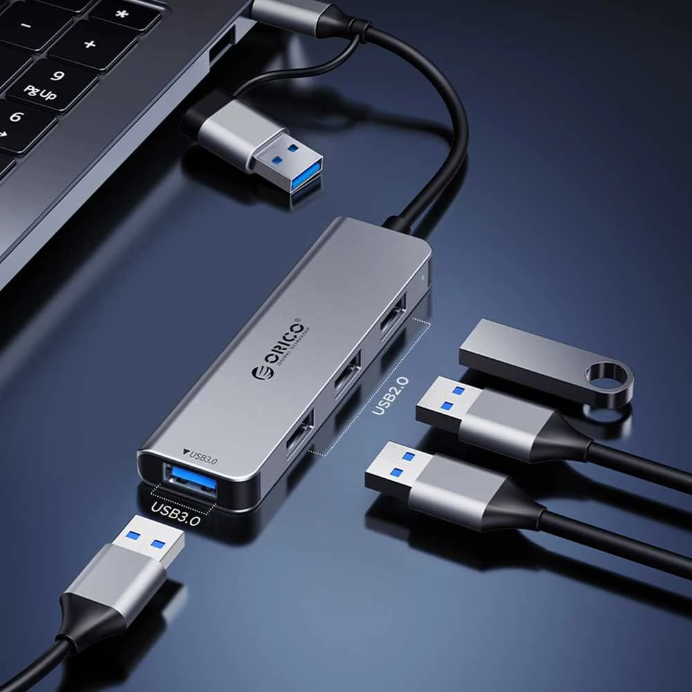 Orico YSB4-U2 USB-A/USB-C šakotuvo prijungimo stotelė 2x USB-A 2.0 + 1x USB-A 3.0 + 1x USB-C 2.0 + 1x USB-C – pilkos spalvos