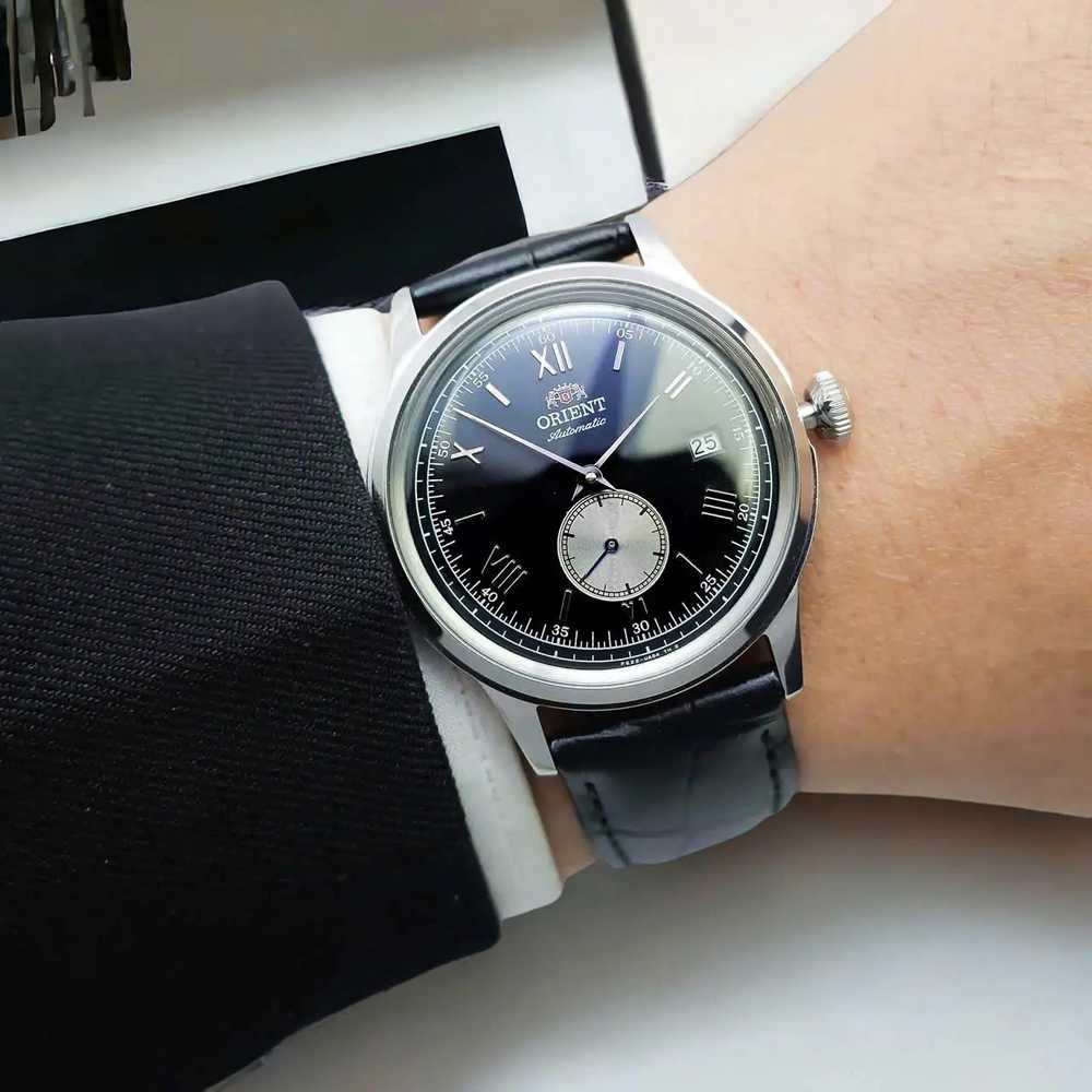 Orient Bambino mažų sekundžių vyriškas laikrodis RA-AP0101B30B+ dėžutė