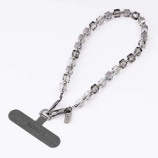 UNIQ Coehl Candy Gem Handstrap universal phone strap for hand sidabro spalvos/sidabro spalvos spar
