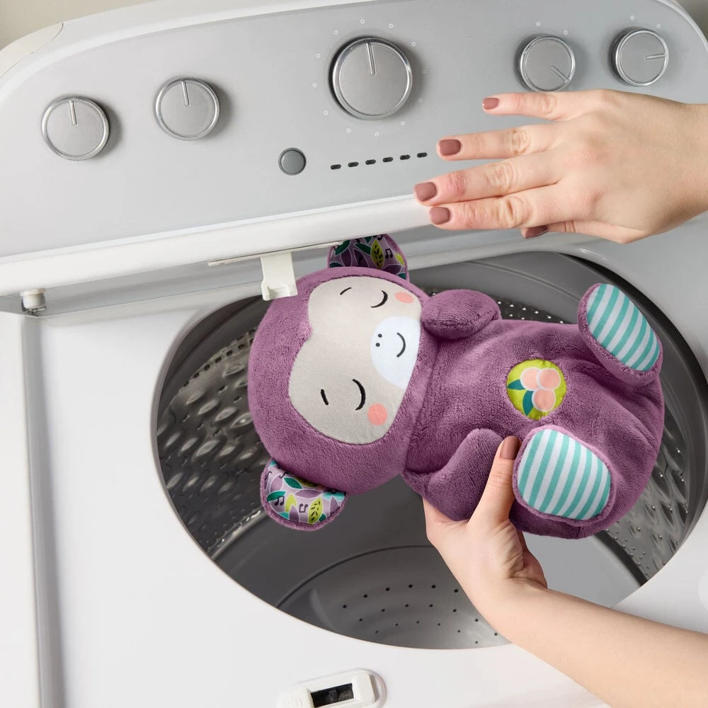 Fisher Price Violetinė mieganti beždžionėlė - pliušinis žaislas su garsais ir melodijomis