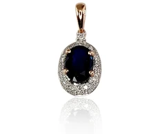 Auksinis pakabukas su brangakmeniais. Metalas: Raudonas Auksas. Praba: 585°. Akmuo: Briliantai , Safyras - 1.01 g. - 17 mm. - Briliantai (0,097Ct), Safyras (1,111Ct)