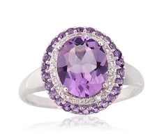 Auksinis žiedas - 18 - 2.79 g. - Briliantai (0,104Ct), Ametistas (2,571Ct)