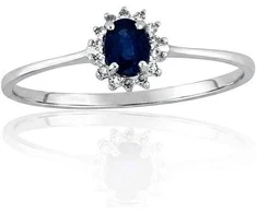 Auksinis žiedas su brangakmeniais. Metalas: Baltas Auksas. Praba: 585°. Akmuo: Briliantai , Safyras - 17 - 0.84 g. - Briliantai (0,038Ct), Safyras (0,25Ct)