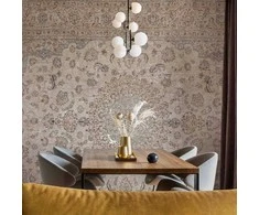 Artgeist Fototapetas - Sand carpet - worn Persian carpet with rich decorative motifs