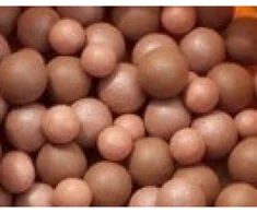 Avon Bronzing Pearls (bronziniai perlai) 28 g, tamsūs
