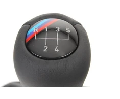 BMW E36 apšviestas odinis pavarų svirties dangtelis originalus 25111221901