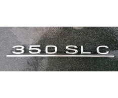 "Mercedes-Benz" W107 galinis bagažinės emblema su logotipu Originali A1078170315