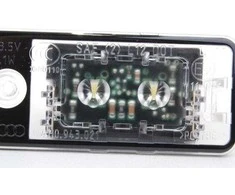 VAG Audi A4 8E B6 B7 / A6 4F LED valstybinio numerio ženklo žibintas kairysis 4H0943021 originalus