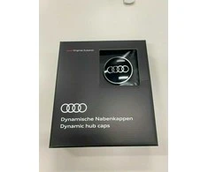 VAG "Audi Dynamic" besisukantis centrinis stebulės dangtelis juodas originalus 4M8071006A