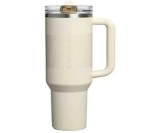 Stanley Termospuodelis su šiaudeliu „The Quencher ProTour Flip Straw Tumbler“ 1,18 l kreminės spalvos