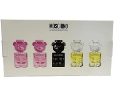 Moschino rinkinys: Toy 2 Bubble Gum EDP Unisex, 2 buteliukai, 5 ml + Toy 2 EDP Unisex, 2 buteliukai, 5 ml + Toy Boy Unisex parfuminis vanduo, 5 ml