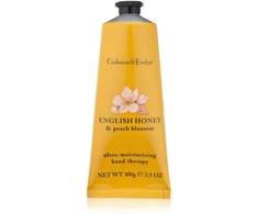 Crabtree &amp; Evelyn drėkinamasis rankų kremas su medumi ir persikų žiedais, 25 g
