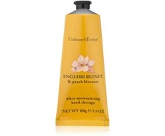 Crabtree &amp; Evelyn drėkinamasis rankų kremas su medumi ir persikų žiedais, 25 g