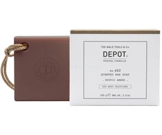 „Depot 600 Body Solutions No. 602“ valomasis muilo gabalėlis su botaniniu kompleksu ir mistinio gintaro kvapu, 100 g