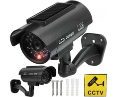 Atrapa Netikra CCTV kamera su saulės stebėjimo kamera, mirksinčia LED lempute ant sienos