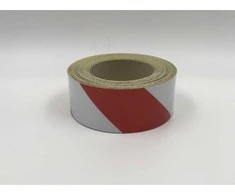 Juosta atšvaitinė 50mm x 1m BALTA/RAUDONA klijuojama ( į dešinę)