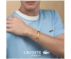 Lacoste Nuotykių ieškotojo paauksuota plieninė atvira vientisa apyrankė 2040527