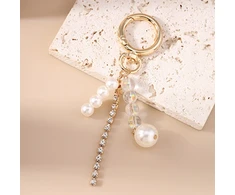 Troli Gold-plated pendant with crystals and synthetic pearls
