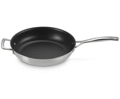 Le Creuset 3 slanu nerusejosa terauda panna ar nepiedegoso parklajumu O28cm ()