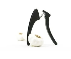 One-piece garlic press