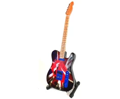 Indominiguitars „Rolling Stones“ mini dekoratyvinė gitara Keith Richards fanui, 27,5 cm, su stovu