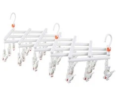 Plastikinis sulankstomas drabužių kabyklas su 29 spaustukais - baltas