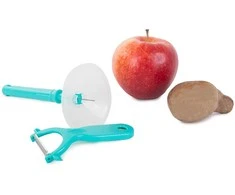 Vegetable peeler fruit scraper with guard
