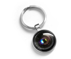 Raktų pakabukas fotoaparato objektyvui