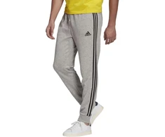 Adidas Essentials Kelnės su siaurėjančiais rankogaliais ir 3 juostelėmis M GK8889